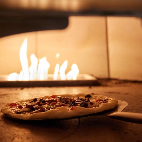 Pizza in wood-fired oven