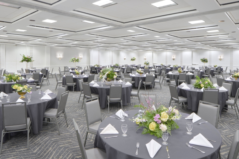 Hilton Ballroom set up in rounds for a dinner reception