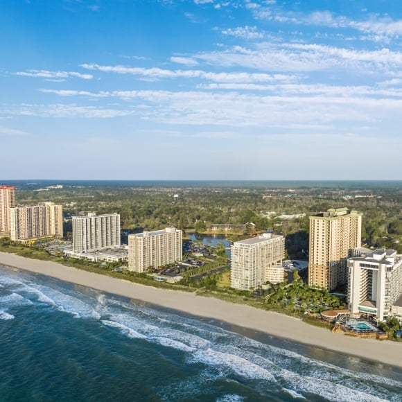 Aerial of Kingston Resorts beachfront hotels and condos