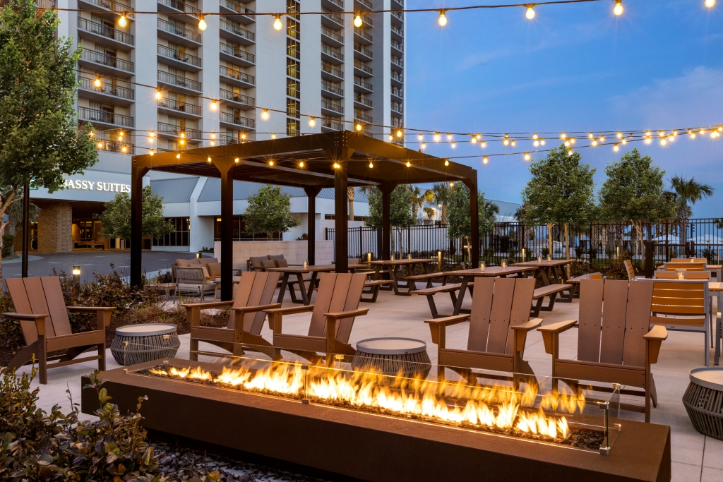 Black Drum Brewing beer garden with a fireplace and Edison lights