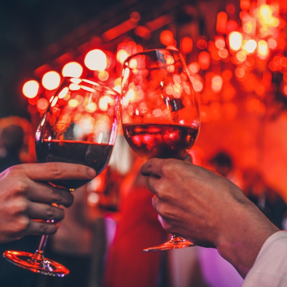 Couple toasting wine glasses